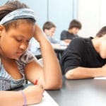 Students taking test 250px