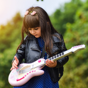 Girl playing guitar